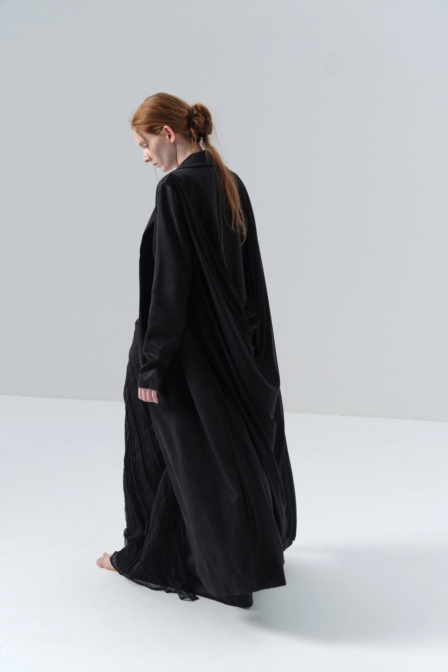 Black Long Coat with Exposed Stitches in Cupro
