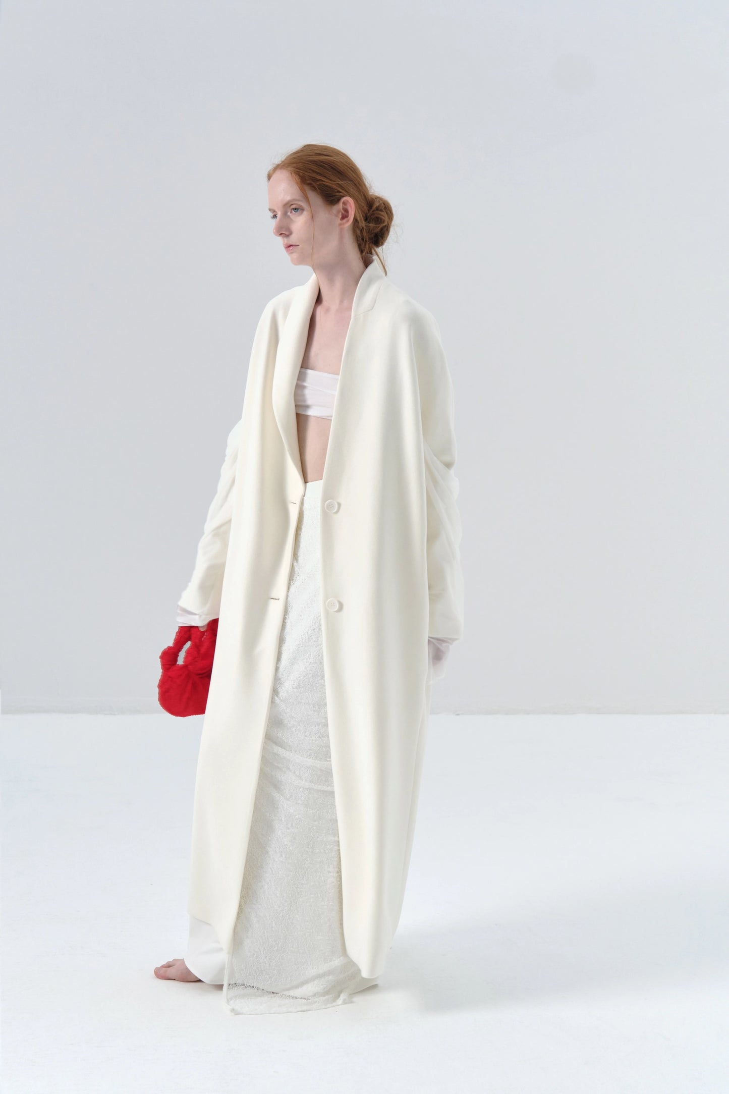 White Long Coat with Spliced Sleeves and Asymmetric Design