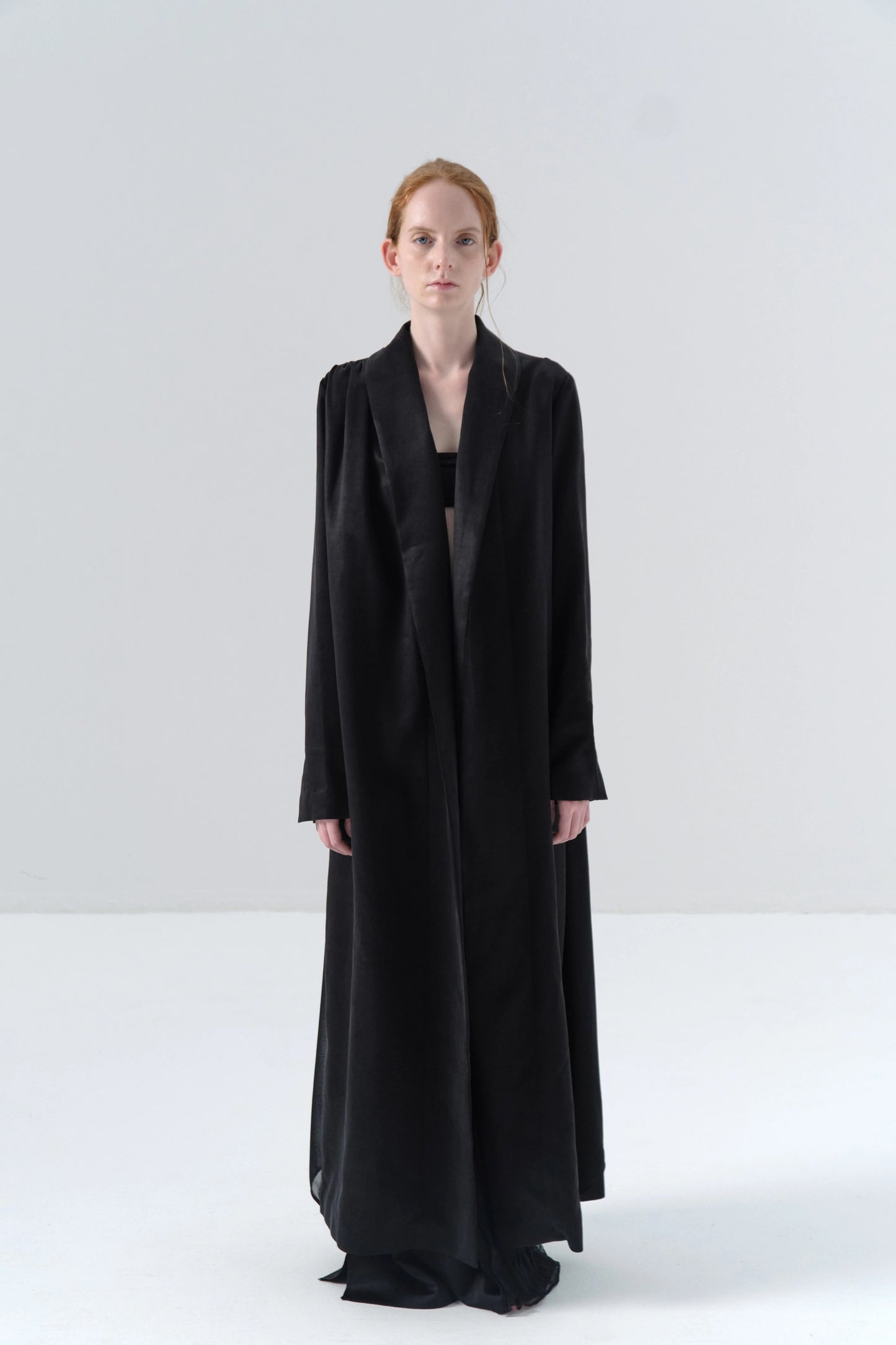 Black Long Coat with Exposed Stitches in Cupro