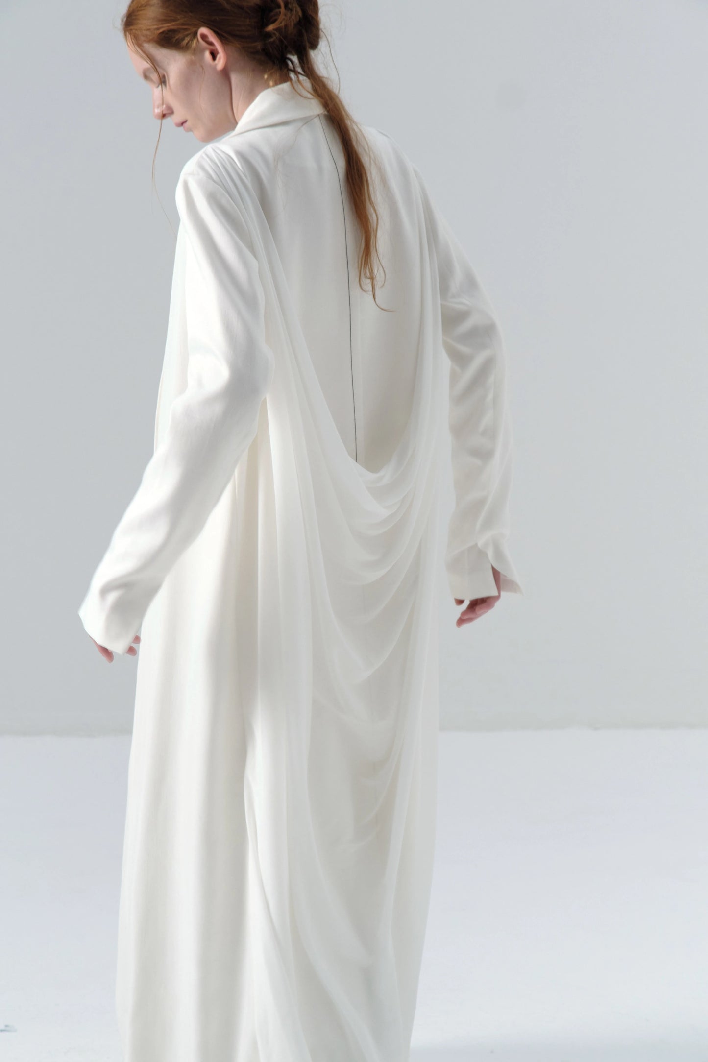 White Long Coat with Exposed Stitches in Cupro