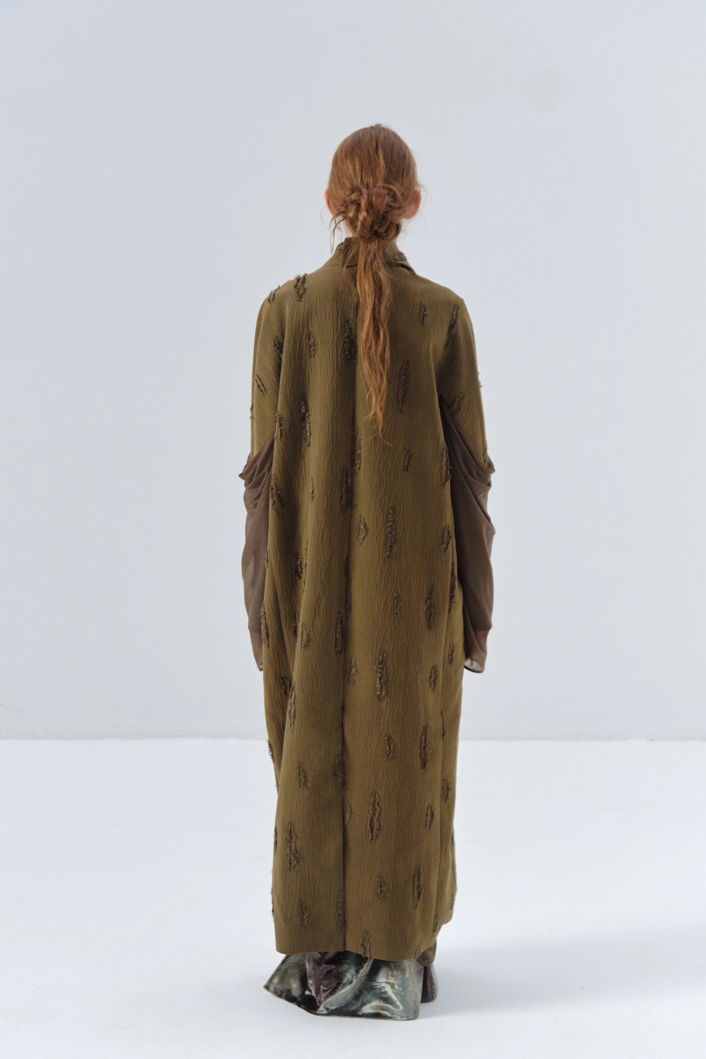Spliced Sleeve Asymmetric Texture Long Coat