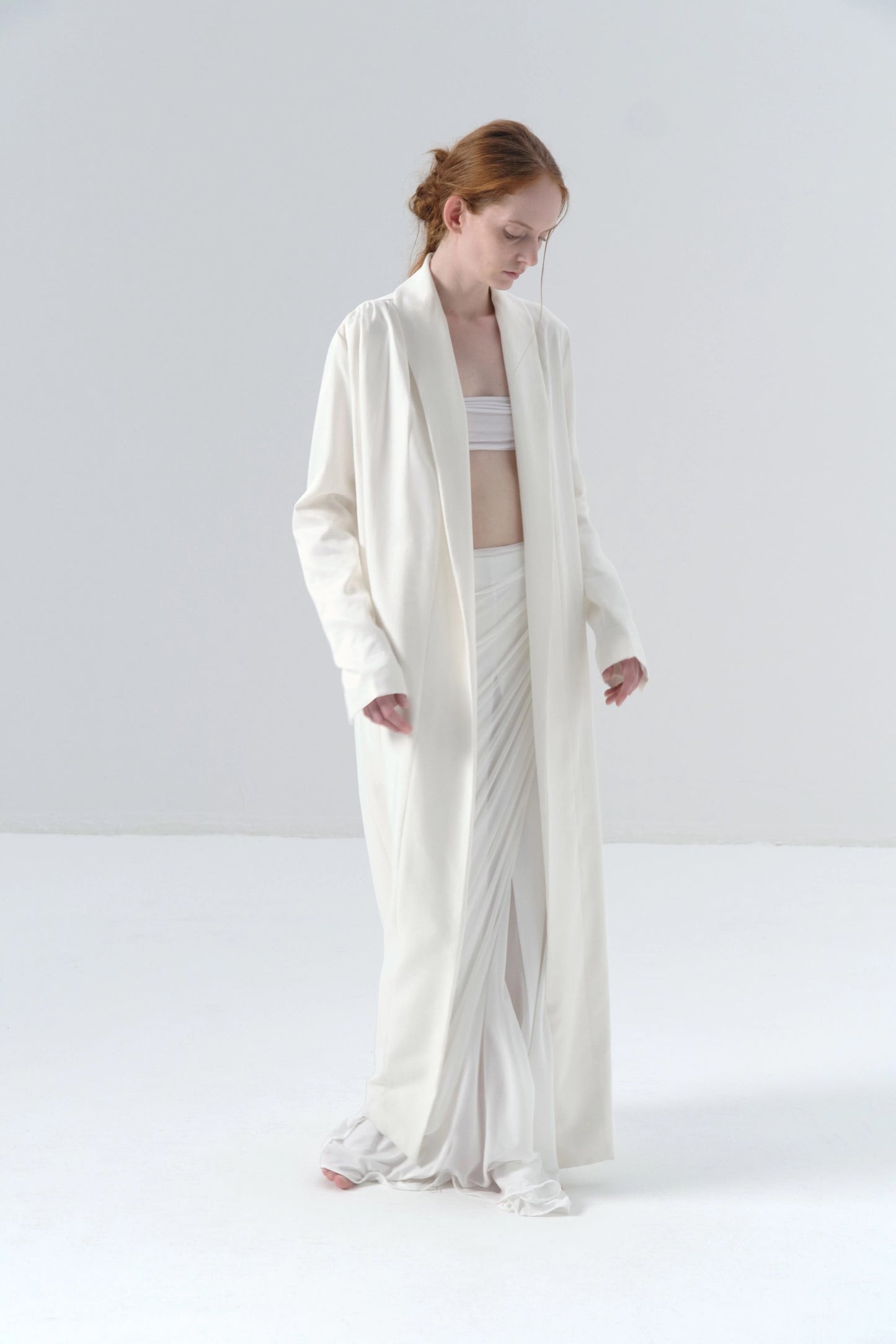 White Long Coat with Exposed Stitches in Cupro