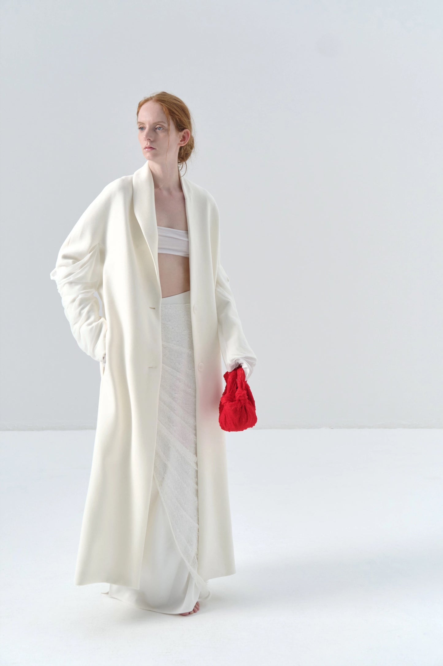White Long Coat with Spliced Sleeves and Asymmetric Design