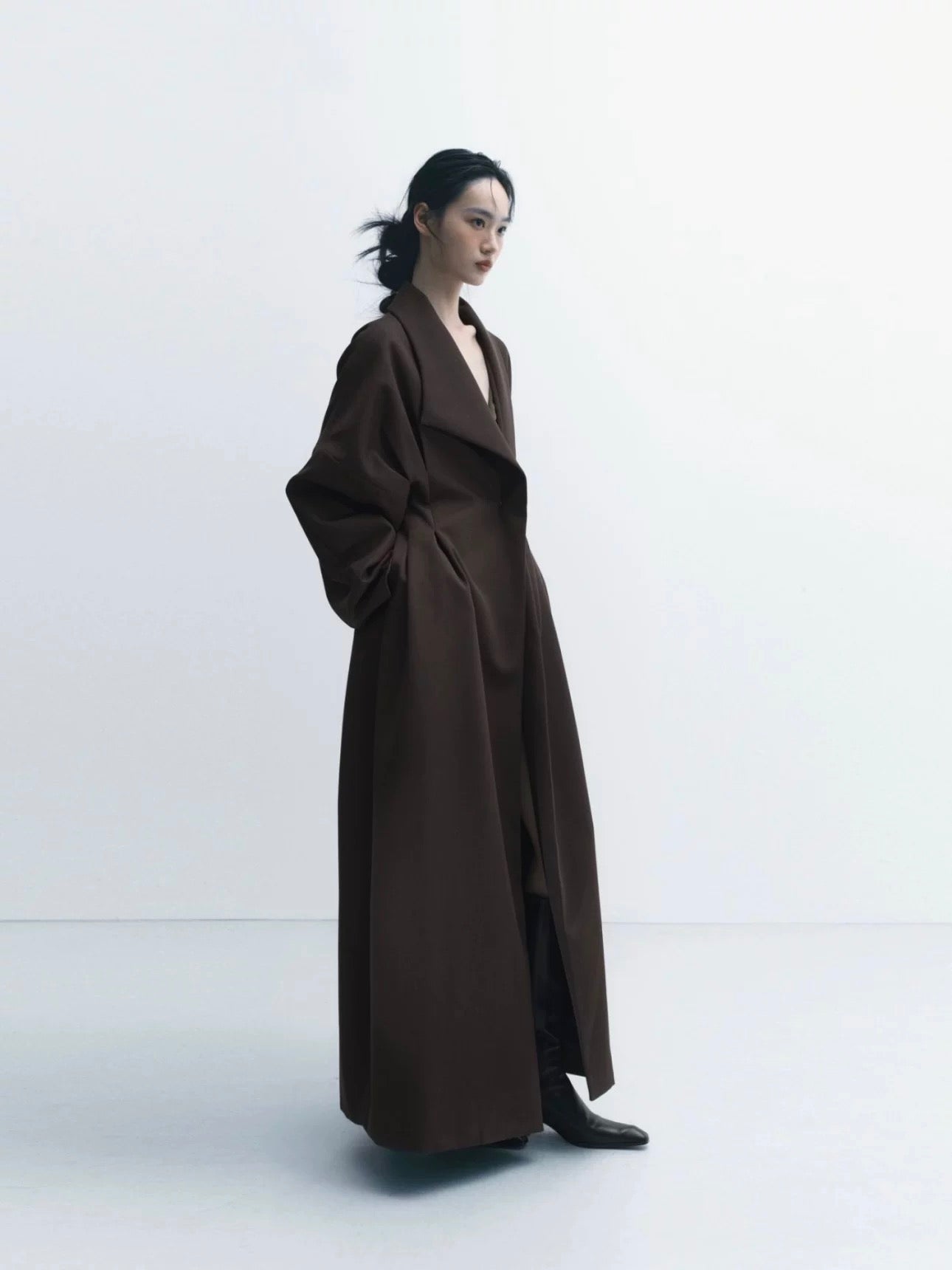 Coat with Three-Dimensional Tailoring and Waist Cinching