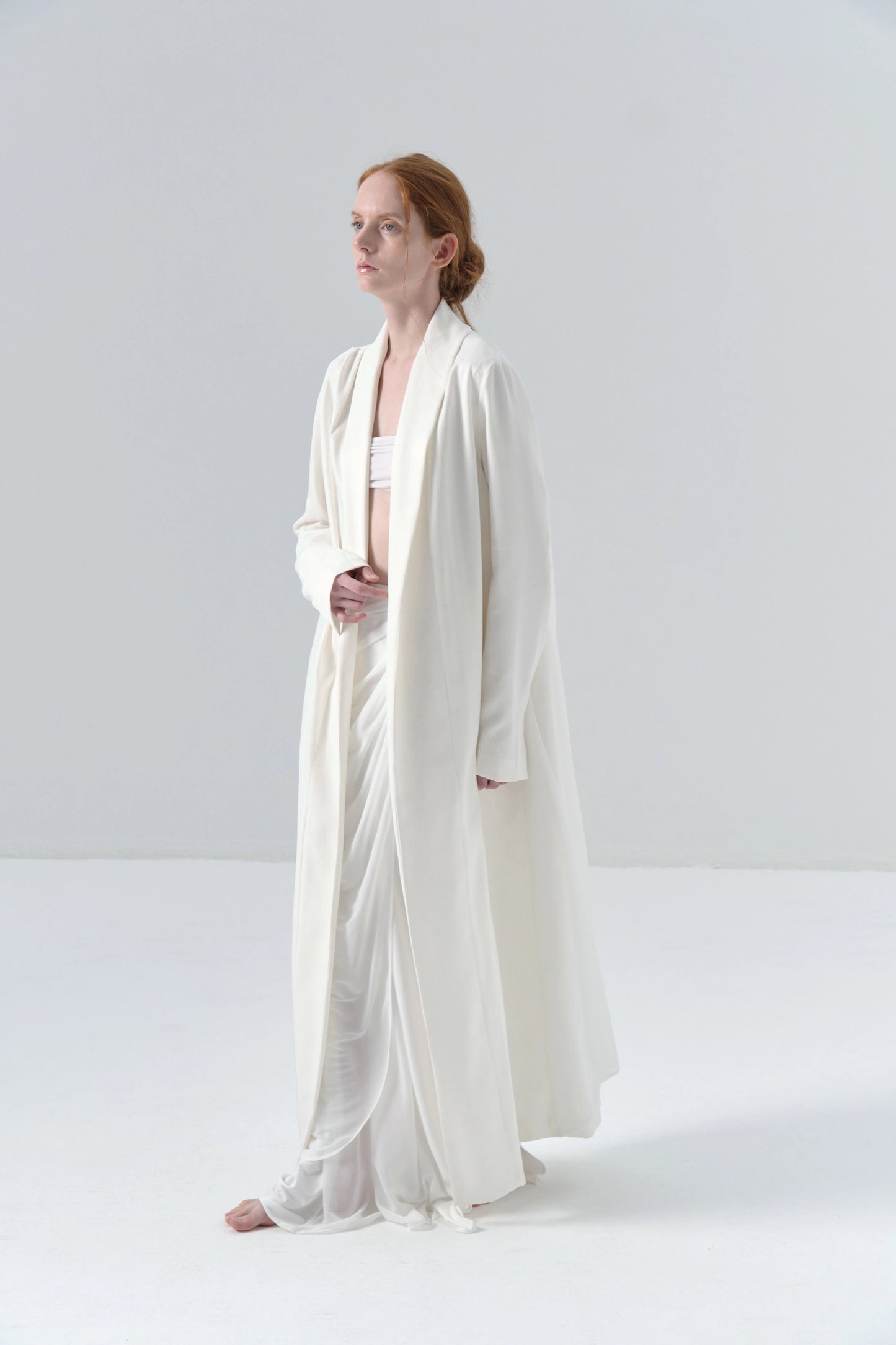 White Long Coat with Exposed Stitches in Cupro