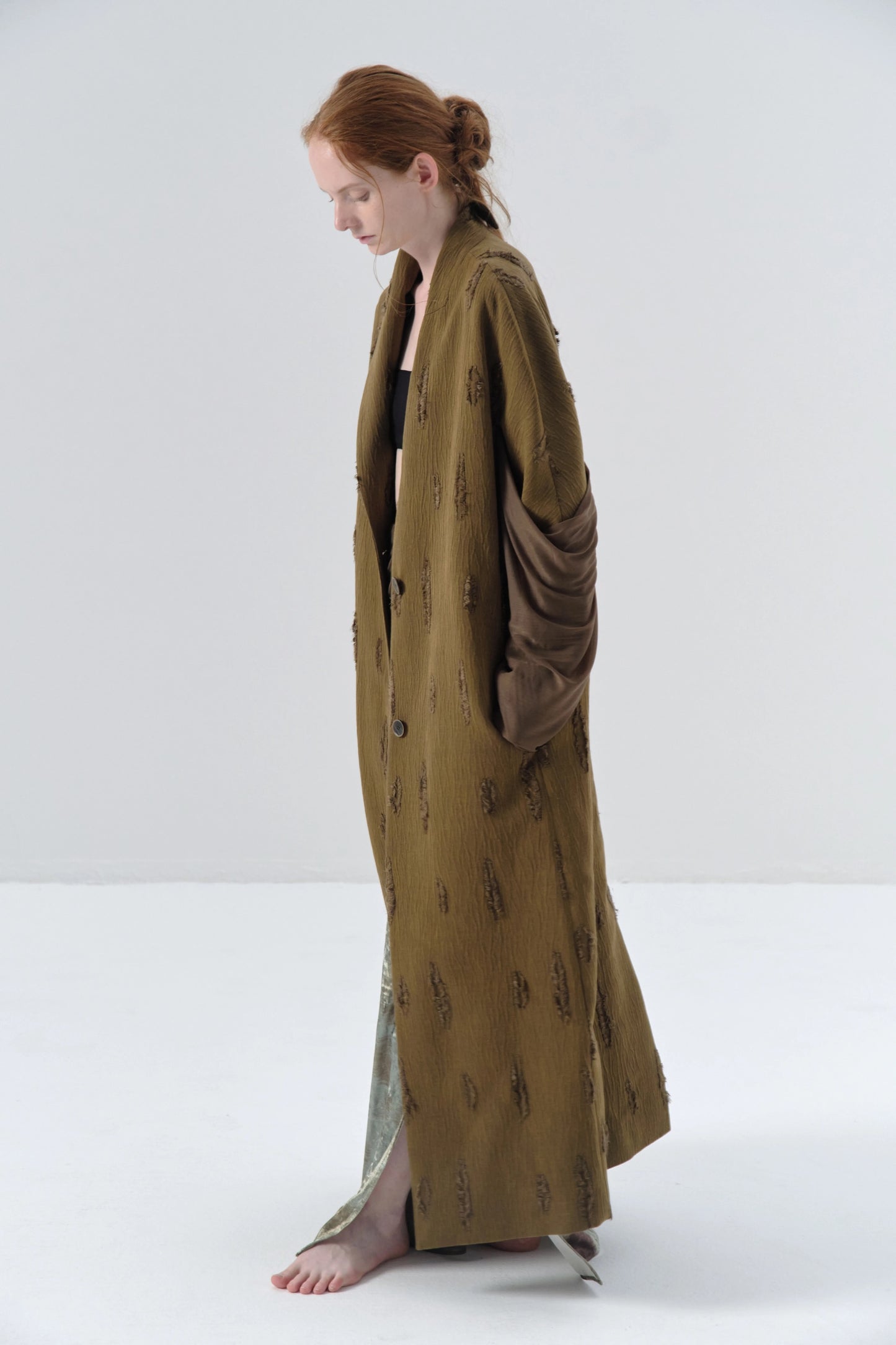 Spliced Sleeve Asymmetric Texture Long Coat