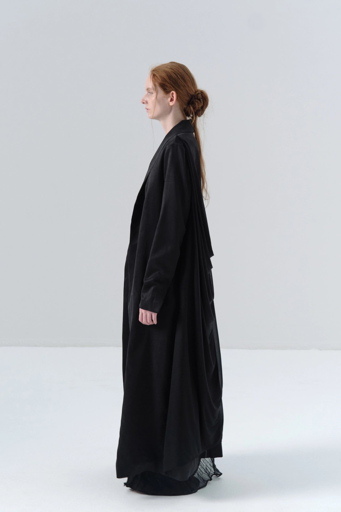 Black Long Coat with Exposed Stitches in Cupro
