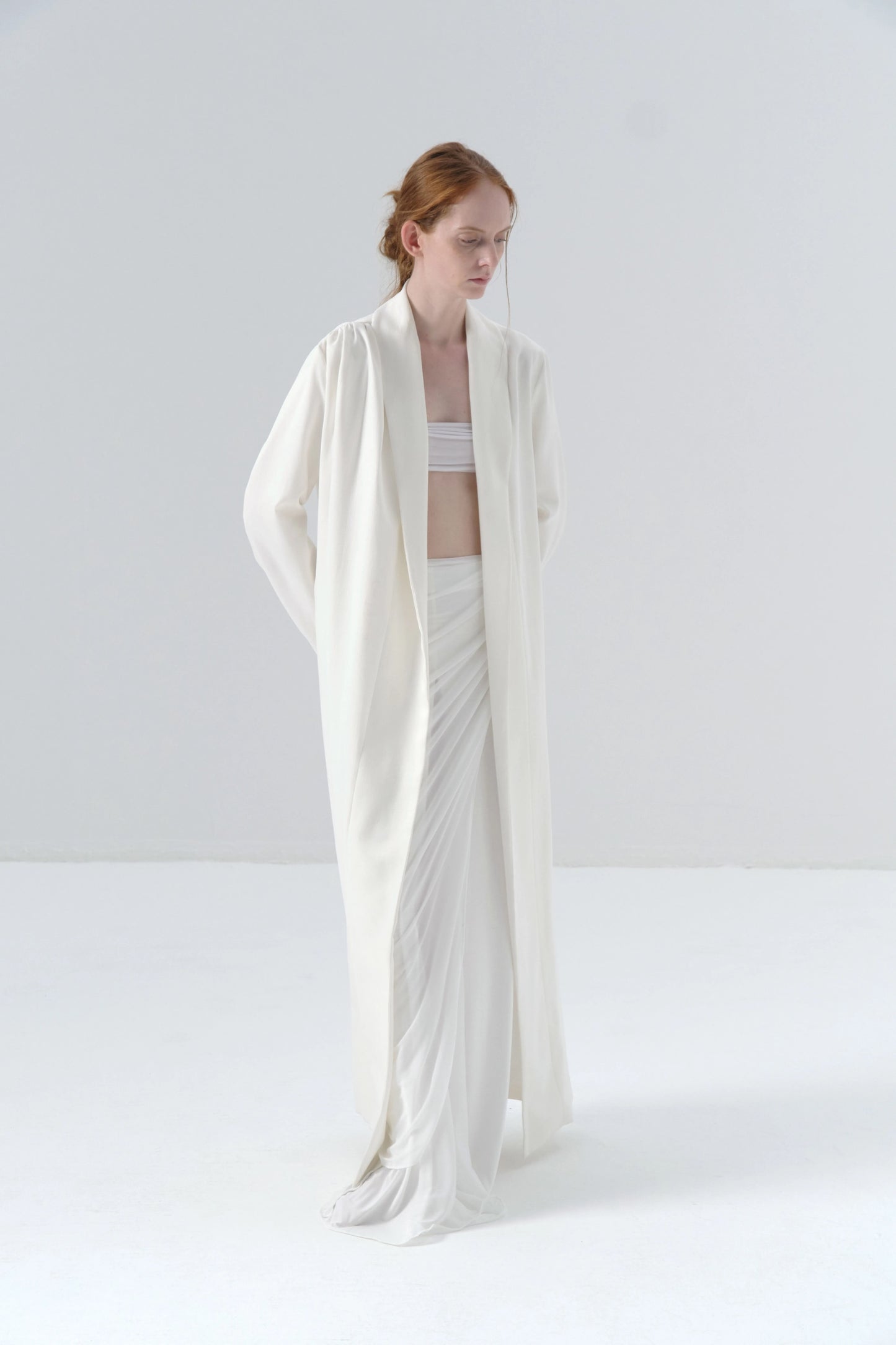 White Long Coat with Exposed Stitches in Cupro
