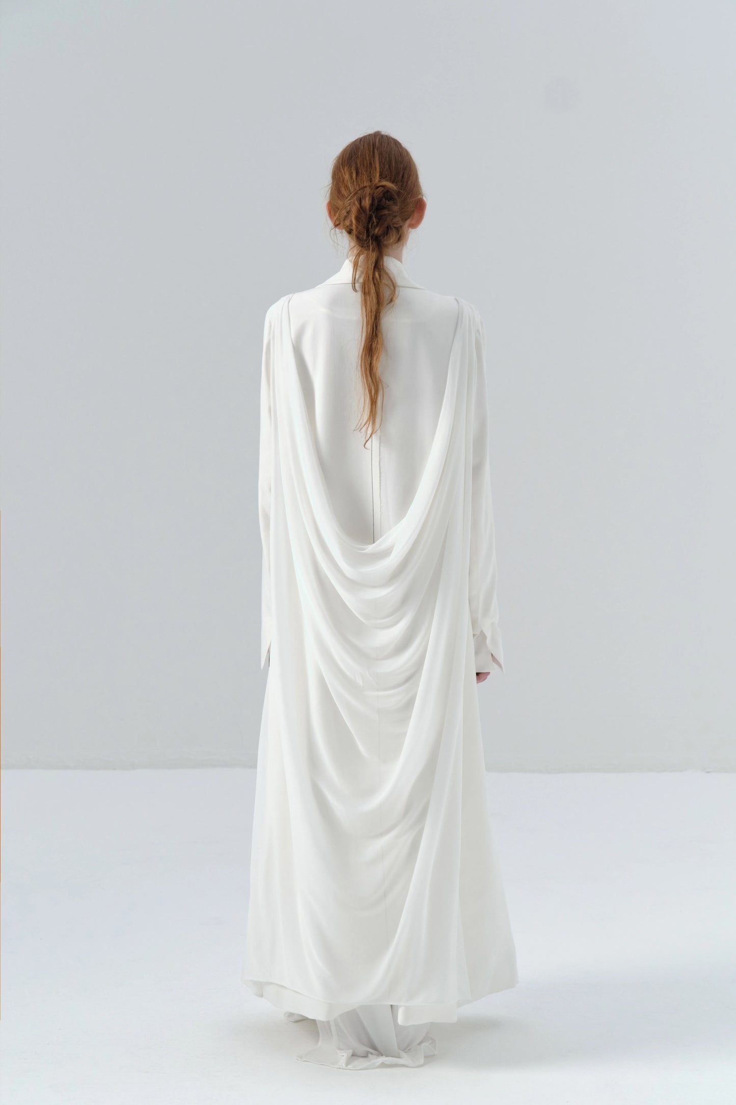 White Long Coat with Exposed Stitches in Cupro