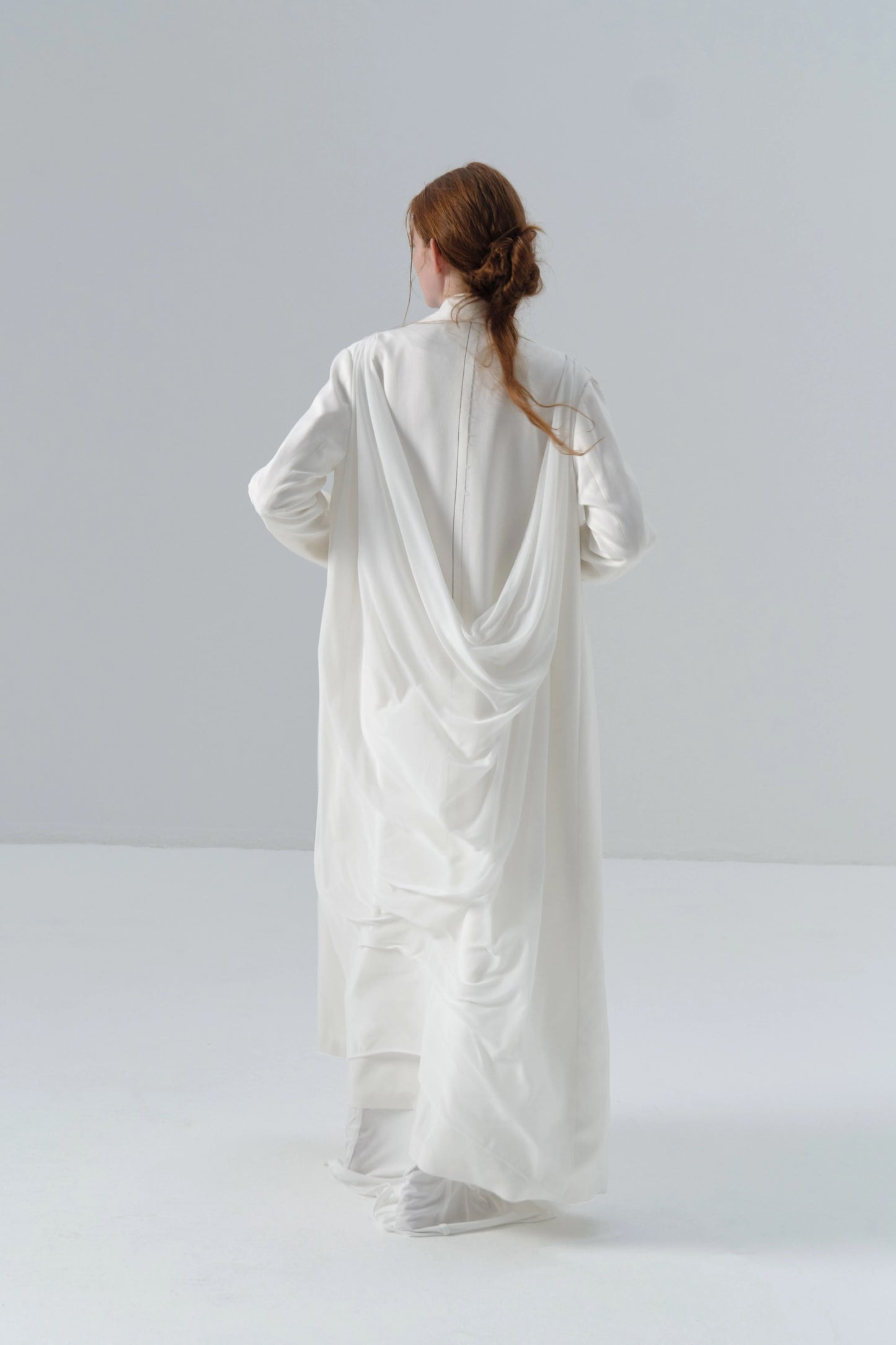 White Long Coat with Exposed Stitches in Cupro