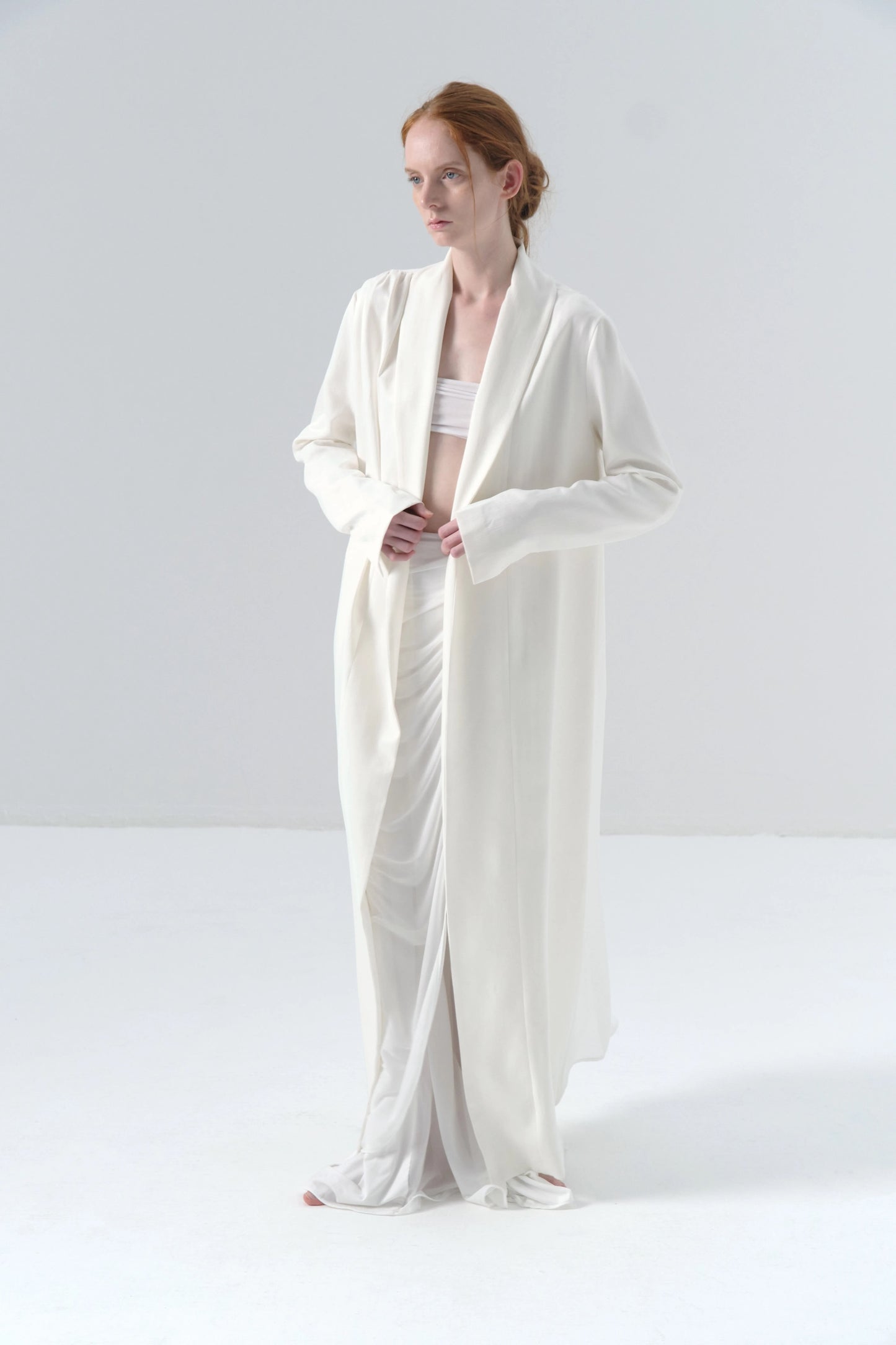White Long Coat with Exposed Stitches in Cupro