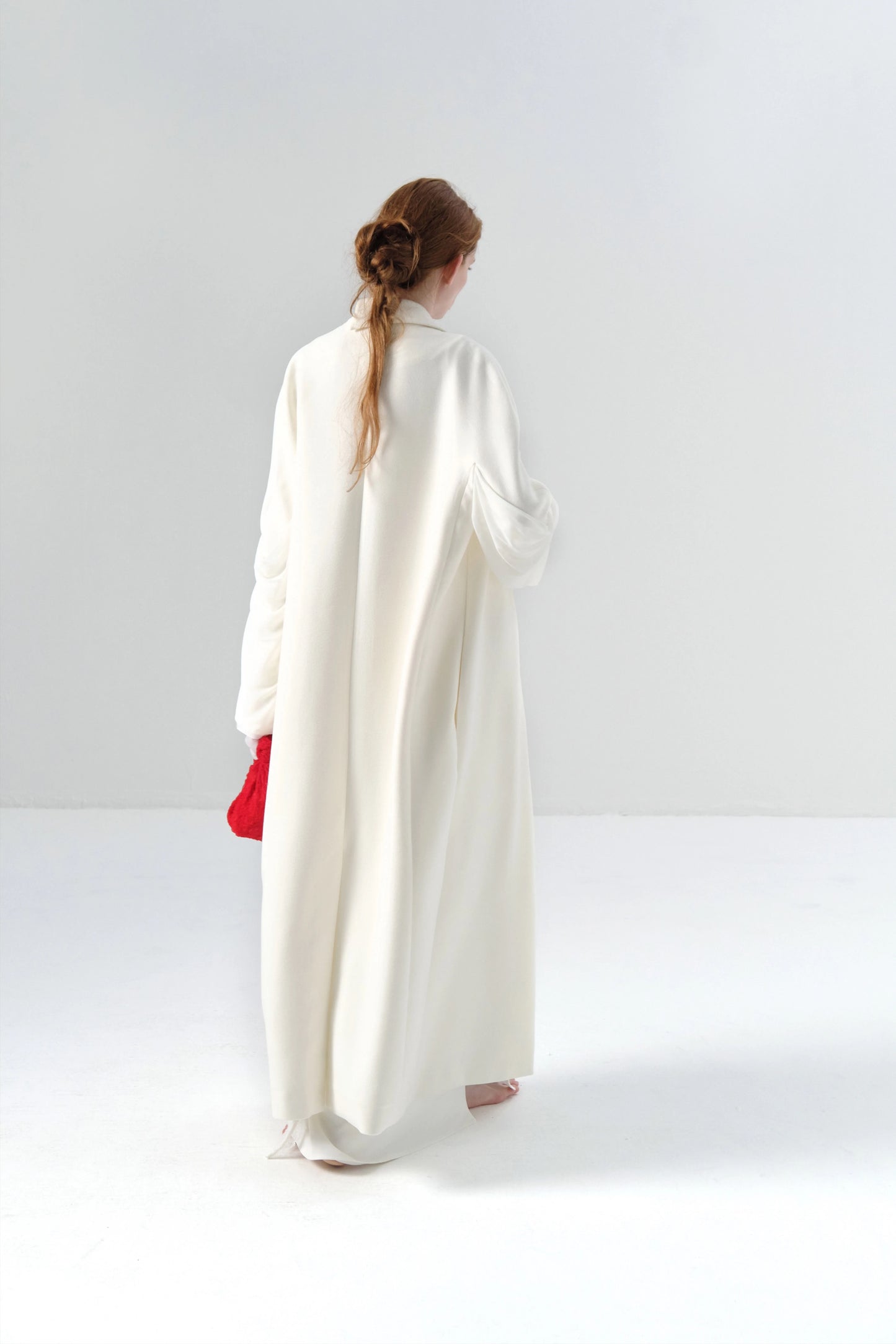 White Long Coat with Spliced Sleeves and Asymmetric Design