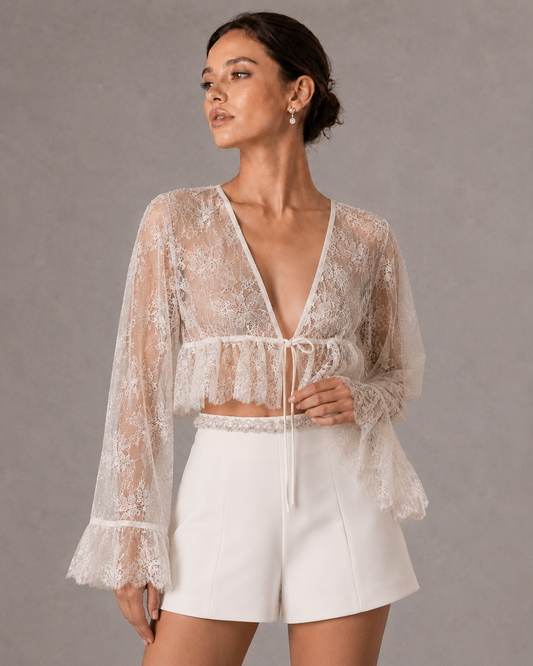 White Sheer Lace Tie Front Cropped Blouse Long Flare Sleeve V Neck Ruffled Hem See Through Top